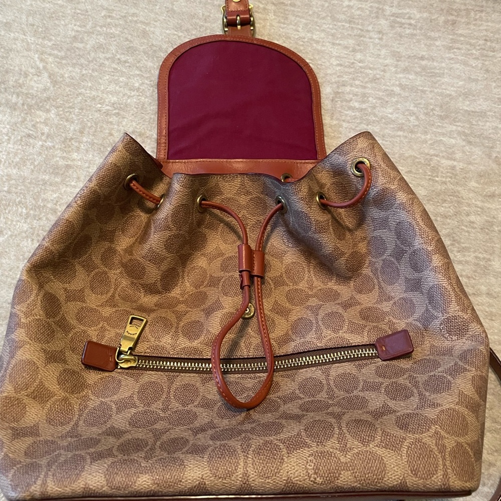 Evie Backpack In Signature Canvas with matching wallet